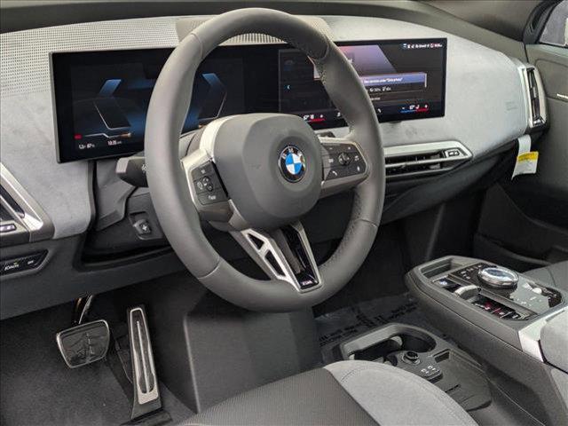 new 2026 BMW iX car, priced at $102,875