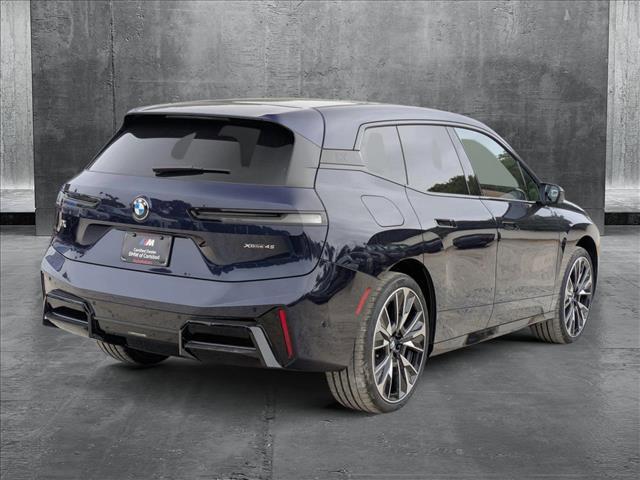 new 2026 BMW iX car, priced at $98,285