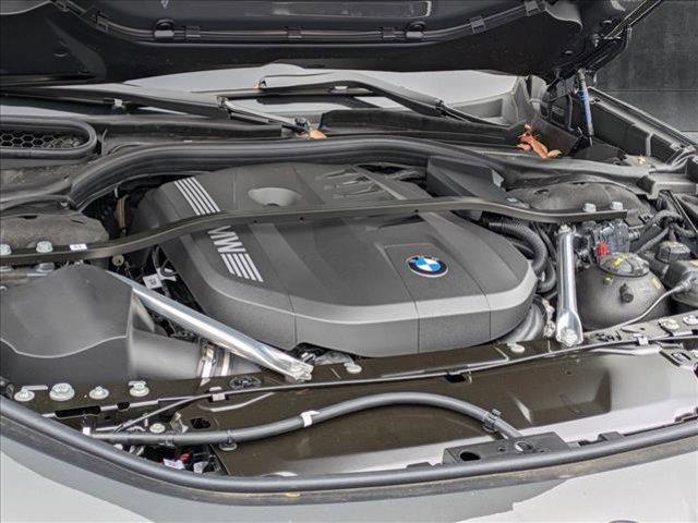 new 2025 BMW 740 car, priced at $106,310