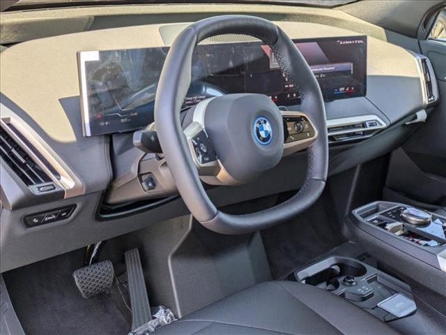 new 2025 BMW iX car, priced at $94,140