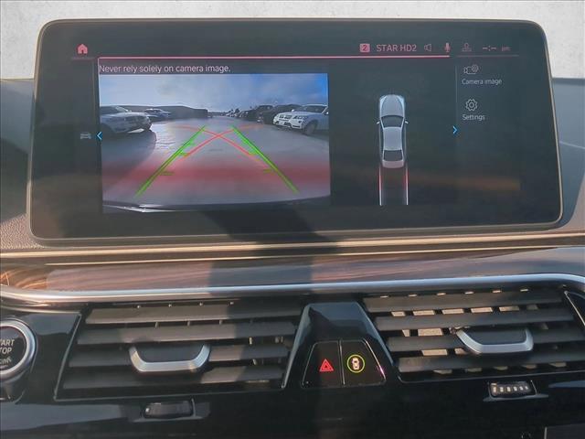 used 2023 BMW 530e car, priced at $34,343