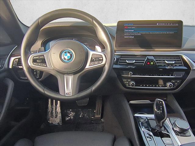 used 2023 BMW 530e car, priced at $34,343