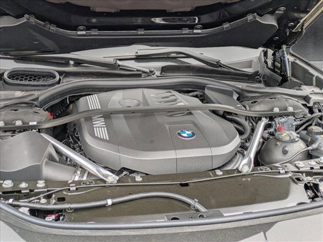new 2025 BMW 740 car, priced at $102,585