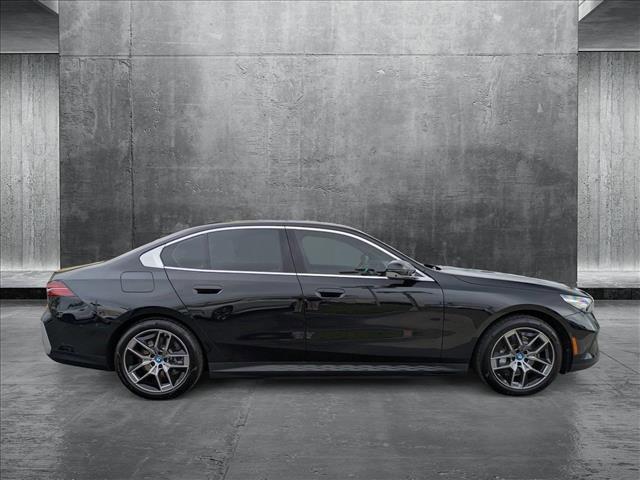 used 2024 BMW i5 car, priced at $55,999