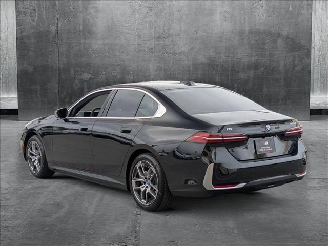 used 2024 BMW i5 car, priced at $55,999