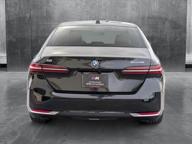 used 2024 BMW i5 car, priced at $55,999