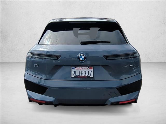 used 2024 BMW iX car, priced at $52,997