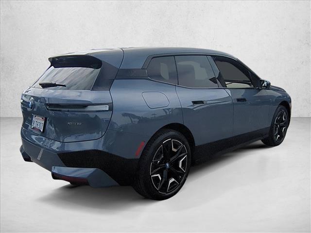 used 2024 BMW iX car, priced at $52,997
