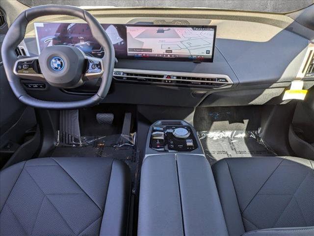 new 2025 BMW iX car, priced at $94,140