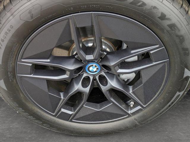 new 2024 BMW iX car, priced at $94,245