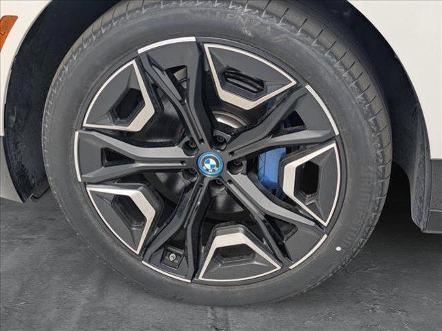 new 2024 BMW iX car, priced at $97,710