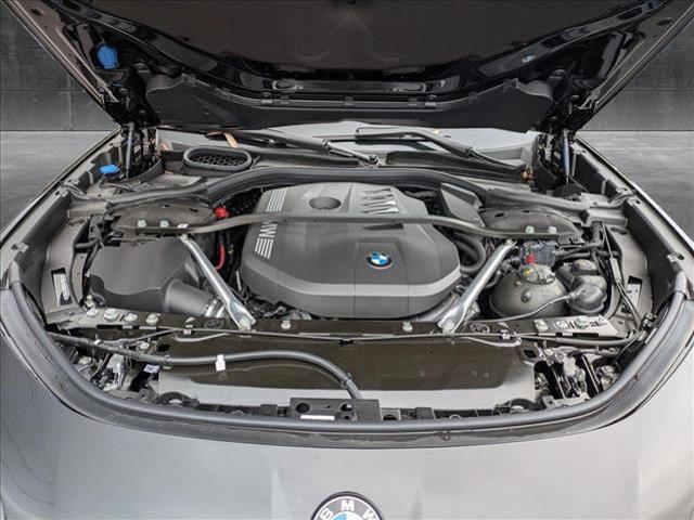 new 2025 BMW 740 car, priced at $102,585