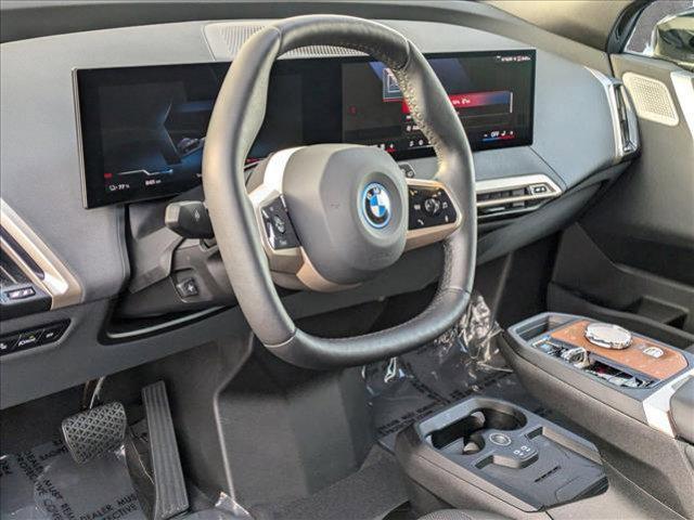 used 2024 BMW iX car, priced at $84,995