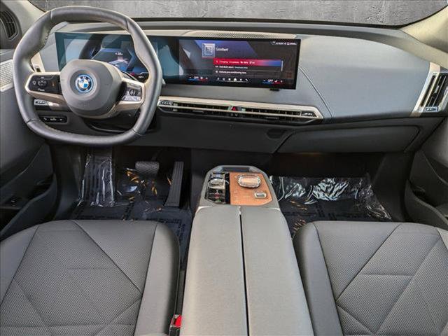 used 2024 BMW iX car, priced at $84,995