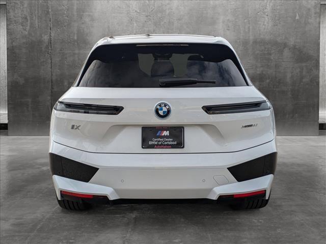 new 2025 BMW iX car, priced at $94,140