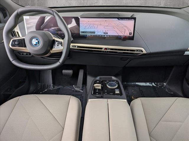 new 2025 BMW iX car, priced at $94,140