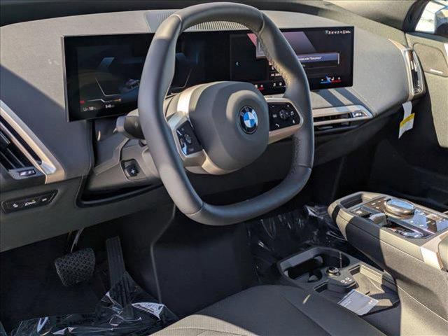 new 2026 BMW iX car, priced at $84,285
