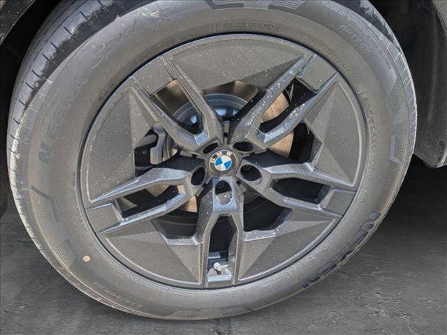 new 2026 BMW iX car, priced at $84,260