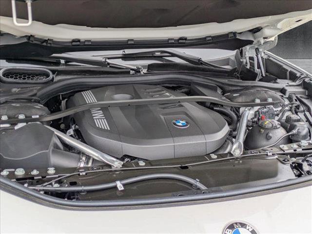 new 2025 BMW 740 car, priced at $104,585
