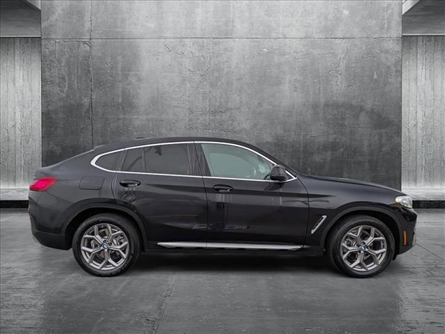 used 2022 BMW X4 car, priced at $40,992