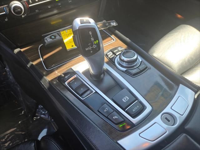 used 2013 BMW 750 car, priced at $9,988
