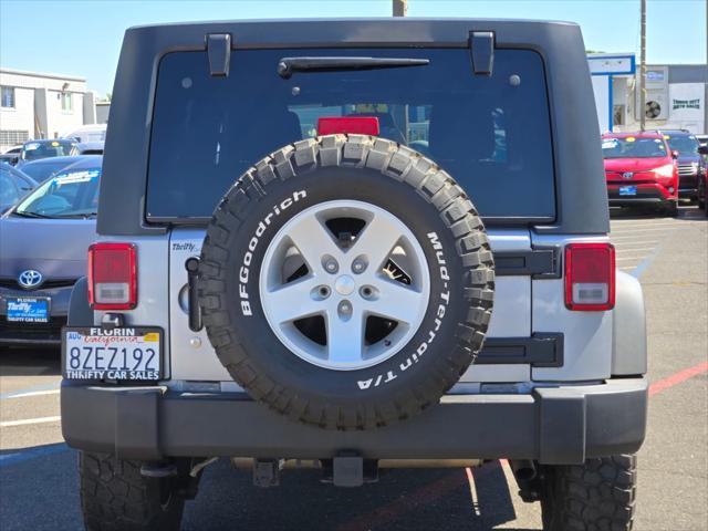 used 2015 Jeep Wrangler Unlimited car, priced at $16,988