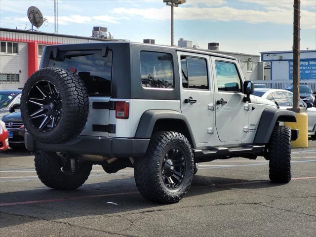 used 2010 Jeep Wrangler Unlimited car, priced at $16,988