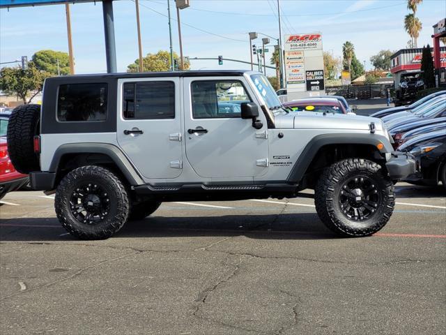 used 2010 Jeep Wrangler Unlimited car, priced at $16,988