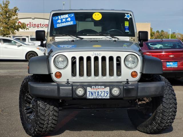 used 2010 Jeep Wrangler Unlimited car, priced at $16,988