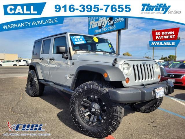 used 2010 Jeep Wrangler Unlimited car, priced at $16,988