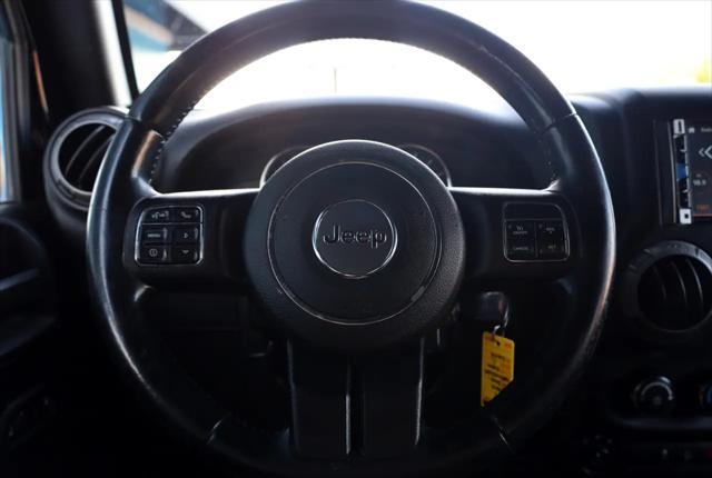 used 2015 Jeep Wrangler Unlimited car, priced at $11,999