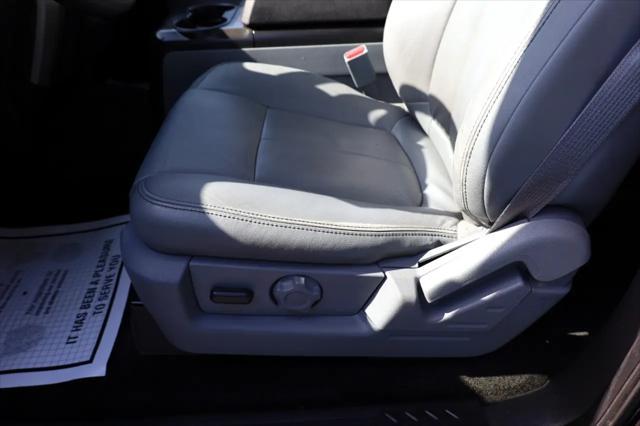 used 2014 Ford F-150 car, priced at $13,999