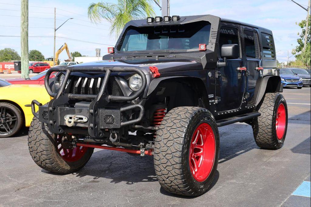 used 2014 Jeep Wrangler Unlimited car, priced at $17,999