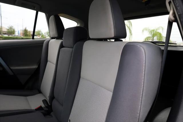 used 2013 Toyota RAV4 car, priced at $15,999