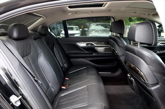 used 2016 BMW 750 car, priced at $16,995