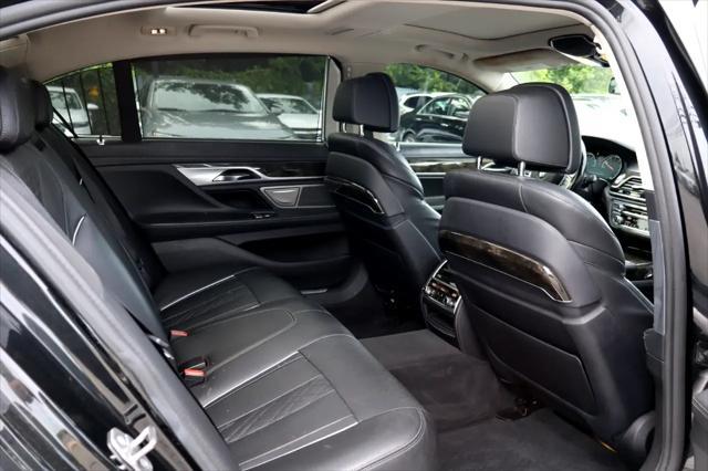 used 2016 BMW 750 car, priced at $16,995