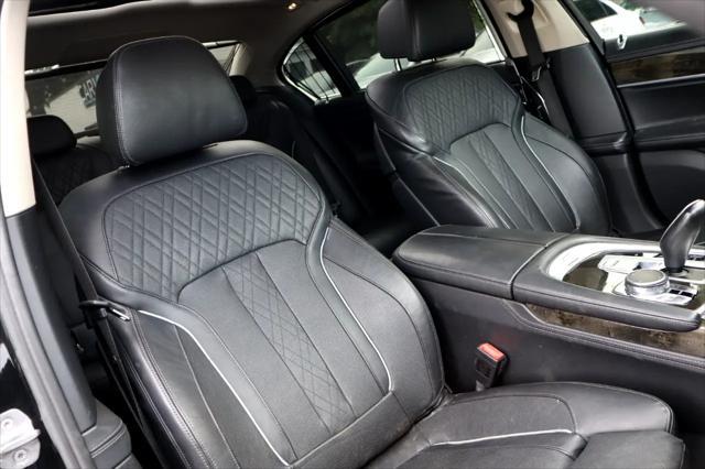 used 2016 BMW 750 car, priced at $16,995