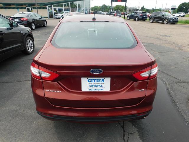 used 2014 Ford Fusion car, priced at $9,999