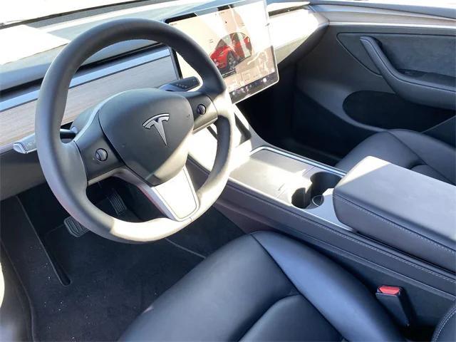 used 2023 Tesla Model Y car, priced at $30,550