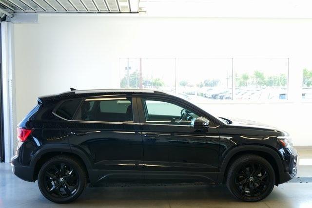 used 2023 Volkswagen Taos car, priced at $20,999