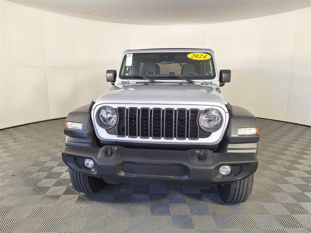 used 2024 Jeep Wrangler car, priced at $33,901