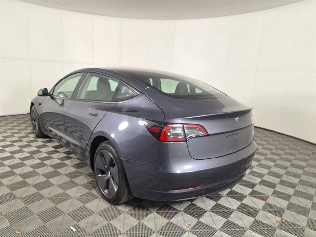 used 2023 Tesla Model 3 car, priced at $27,000