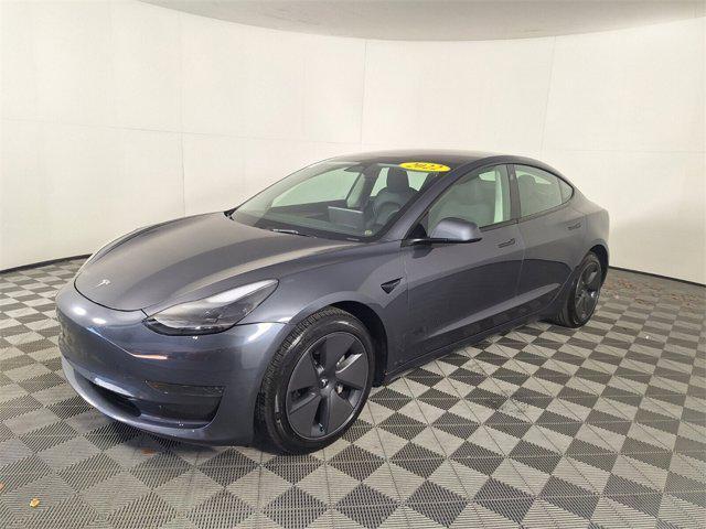 used 2023 Tesla Model 3 car, priced at $27,000