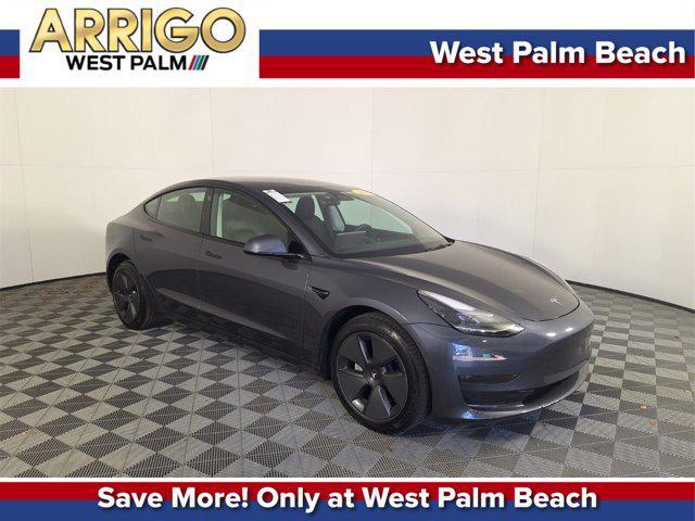 used 2023 Tesla Model 3 car, priced at $27,000