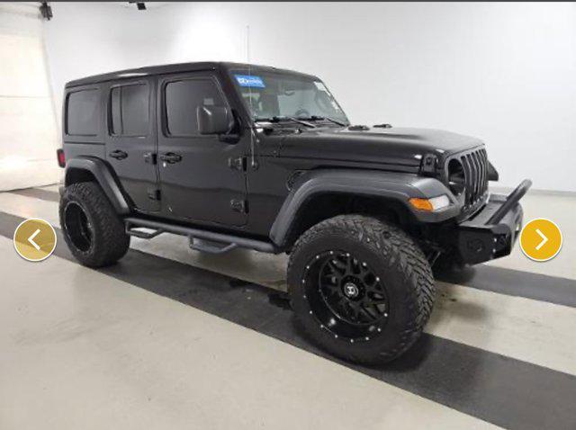 used 2021 Jeep Wrangler Unlimited car, priced at $29,247