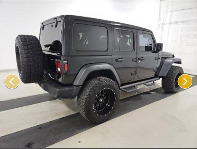 used 2021 Jeep Wrangler Unlimited car, priced at $29,247