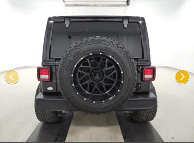 used 2021 Jeep Wrangler Unlimited car, priced at $29,247