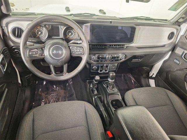 used 2024 Jeep Wrangler car, priced at $34,235