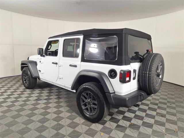 used 2024 Jeep Wrangler car, priced at $34,235