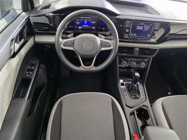 used 2023 Volkswagen Taos car, priced at $18,820